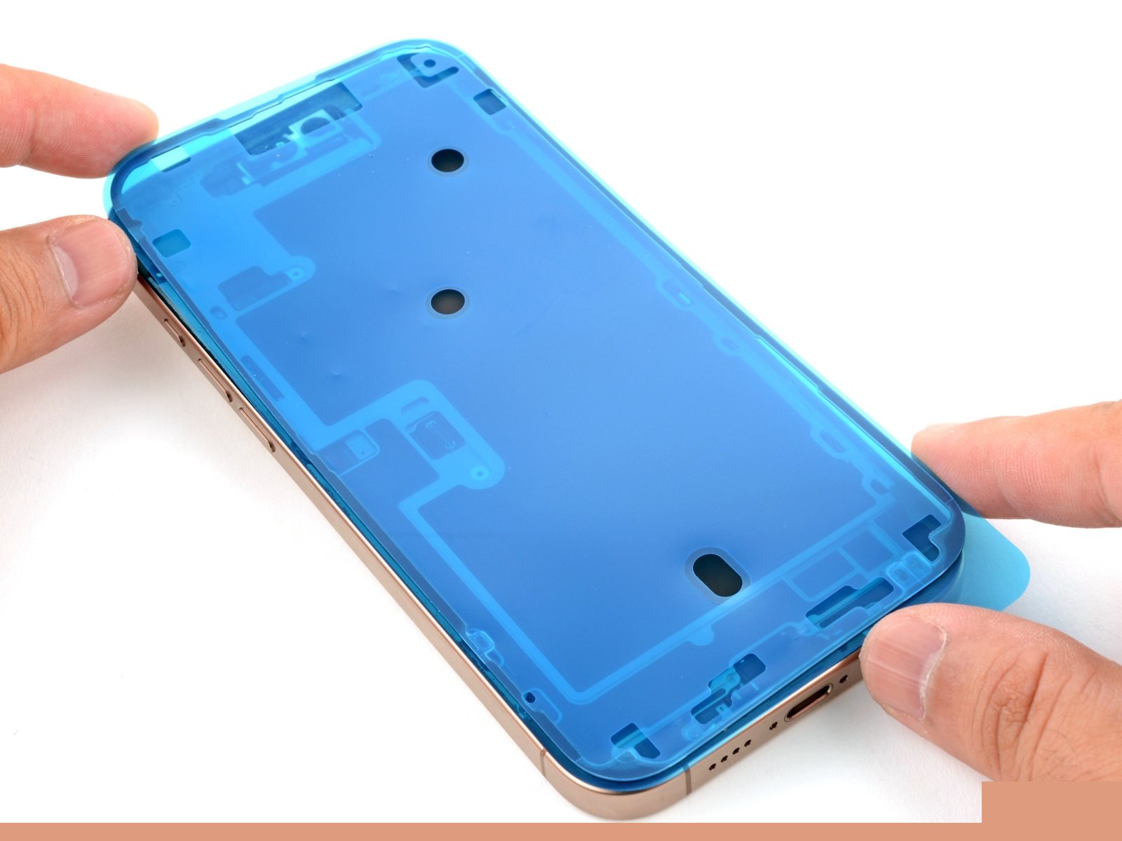 iPhone 16 Pro — Apply the replacement adhesive (logo-free)